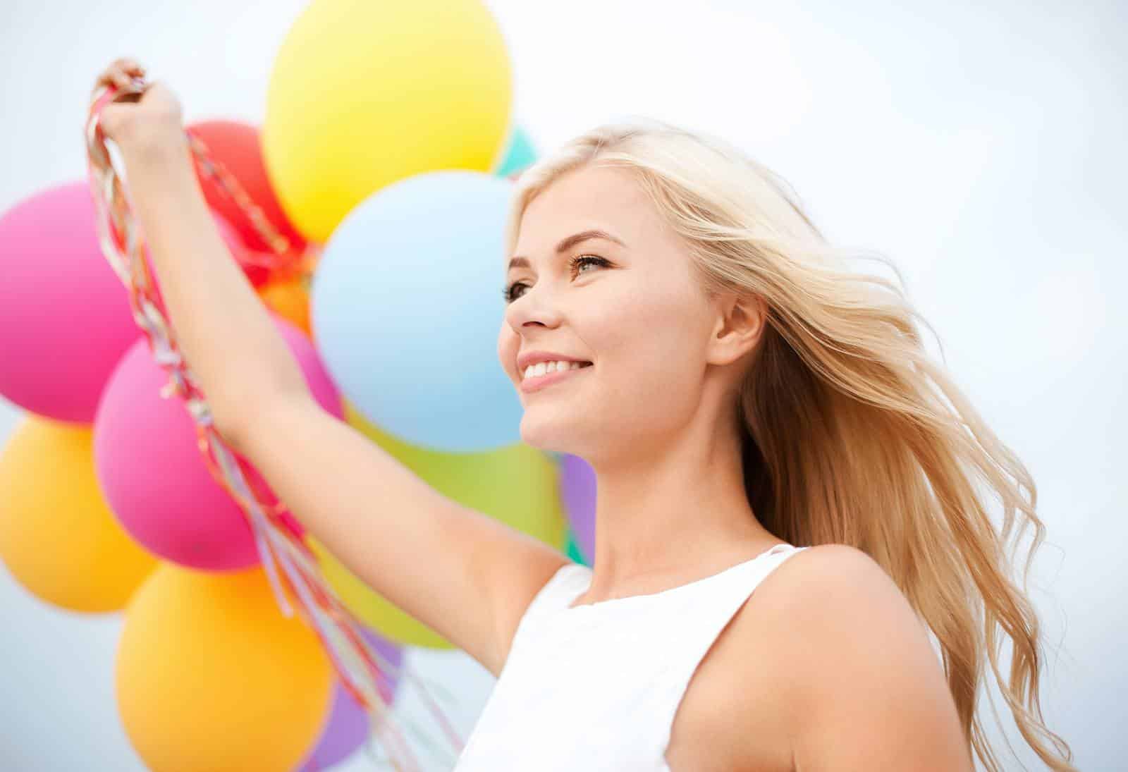 happy extrovert woman balloons