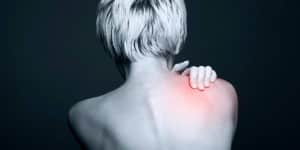 woman suffering neck and shoulder pain gets natural pain relief from all american healthcare